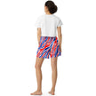Woman posing from behind in signature Buffalo football athletic shorts with an eye-catching red white and blue stripe pattern, bold fan fashion designed for movement and standout style.