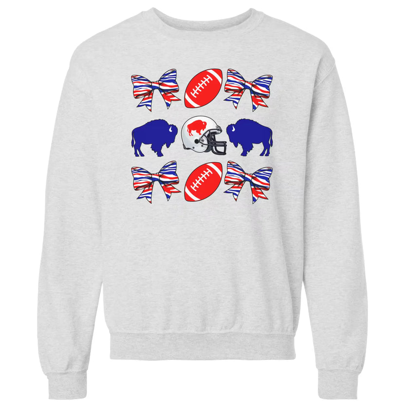 Light gray Buffalo football coquette sweatshirt flat lay featuring fun red footballs, blue buffaloes, and striped bows