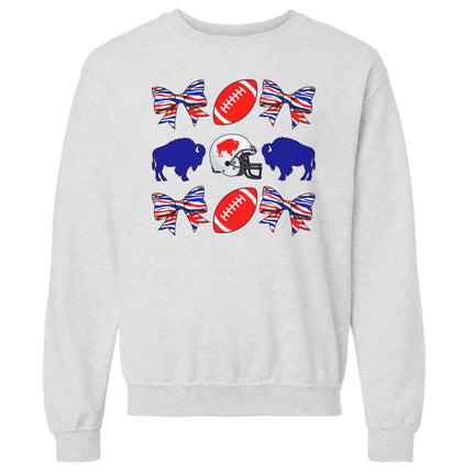 Light gray Buffalo football coquette sweatshirt flat lay featuring fun red footballs, blue buffaloes, and striped bows
