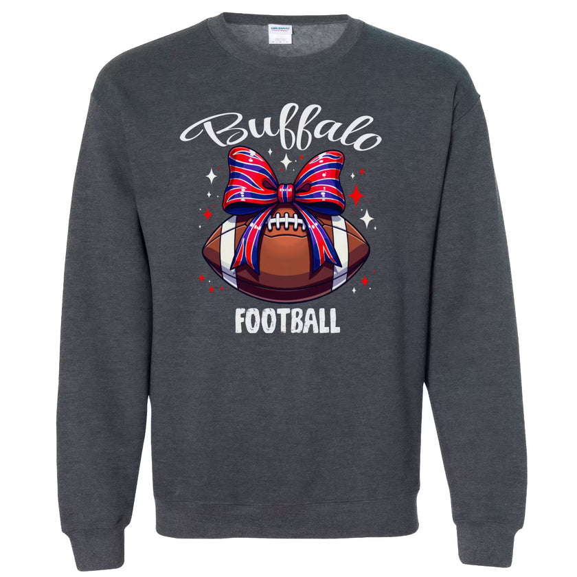 Heather gray Buffalo football sweatshirt featuring bold lettering and coquette football bow graphic, flat lay on white background.