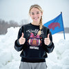 Woman wearing black Buffalo football sweatshirt with coquette bow football graphic, styled outdoors in snowy winter setting.