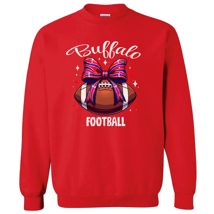 Red Buffalo football sweatshirt with football and red, white, and blue coquette bow design, flat lay on white background.