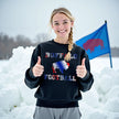 Female model wearing black Buffalo football sweatshirt with red white blue gradient buffalo silhouette and lettering, cozy game day fan outfit.