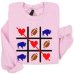 Pink Buffalo Valentine sweatshirt flat lay with football tic tac toe graphic and love theme