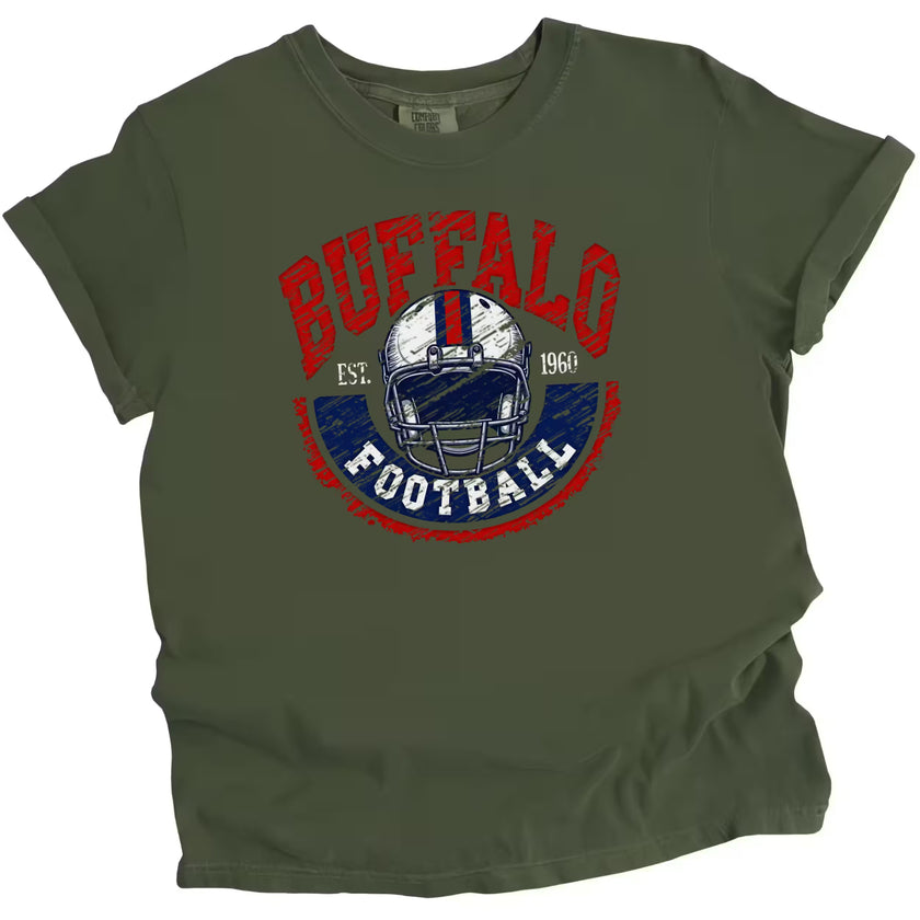 Green Buffalo football t-shirt in vintage 1990s style, white helmet graphic and Est. 1960 logo, flat lay on white background.