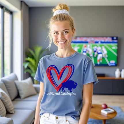 Woman wearing light blue buffalo football shirt standing in her living room watching the game, cozy game day outfit with heart design