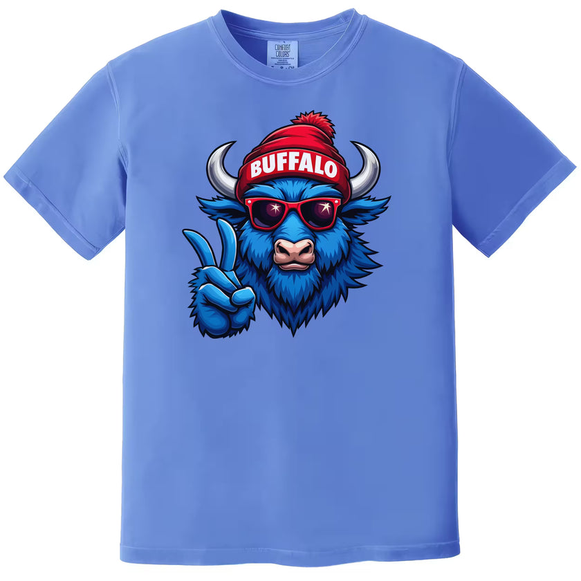 Blue Buffalo pride t-shirt with sunglasses-wearing buffalo graphic, flat lay on white background.