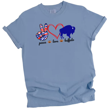 Light blue Peace Love Buffalo t-shirt with red heart and bold buffalo graphic, flat lay on white background.