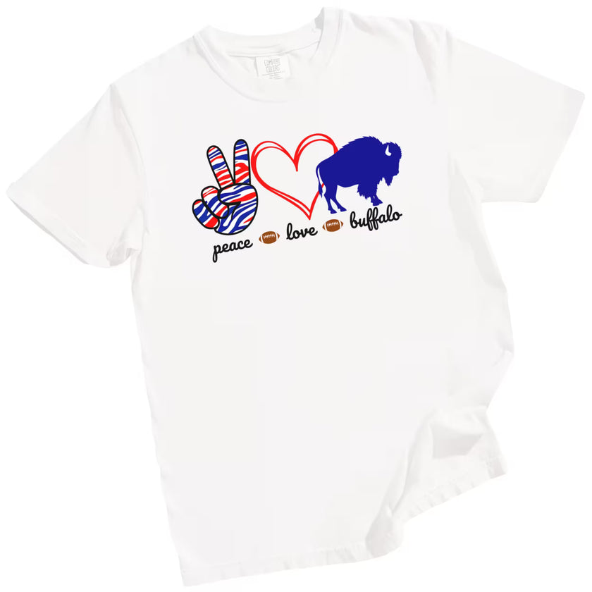 White Peace Love Buffalo t-shirt featuring peace sign graphic, red heart, and blue buffalo, flat lay on white background.