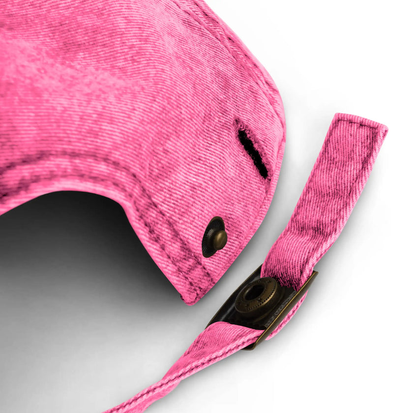 Close-up of pink cotton twill cap adjustable snap closure with clean stitching and vintage style Buffalo football hat construction.