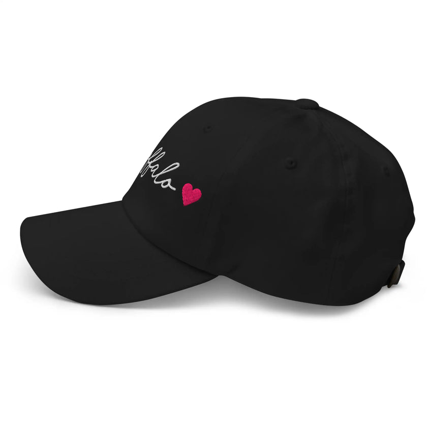 Black classic dad hat left side view featuring embroidered Buffalo script with hot pink heart accent design.
