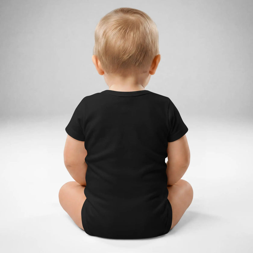 Back view of baby wearing black Buffalo hockey ‘Let’s Go Buffalo’ bodysuit with soft cotton fit and snap closure detail.