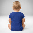 Back view of baby wearing blue Buffalo hockey baby bodysuit with soft cotton fit and snap closure design, Buffalo hockey baby apparel.