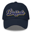 Navy dad hat featuring retro Buffalo hockey script lettering with blue white and gold colorblock embroidery, Buffalo hockey hat design.