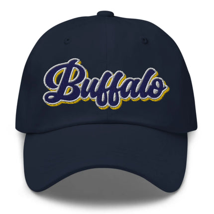Navy dad hat featuring retro Buffalo hockey script lettering with blue white and gold colorblock embroidery, Buffalo hockey hat design.