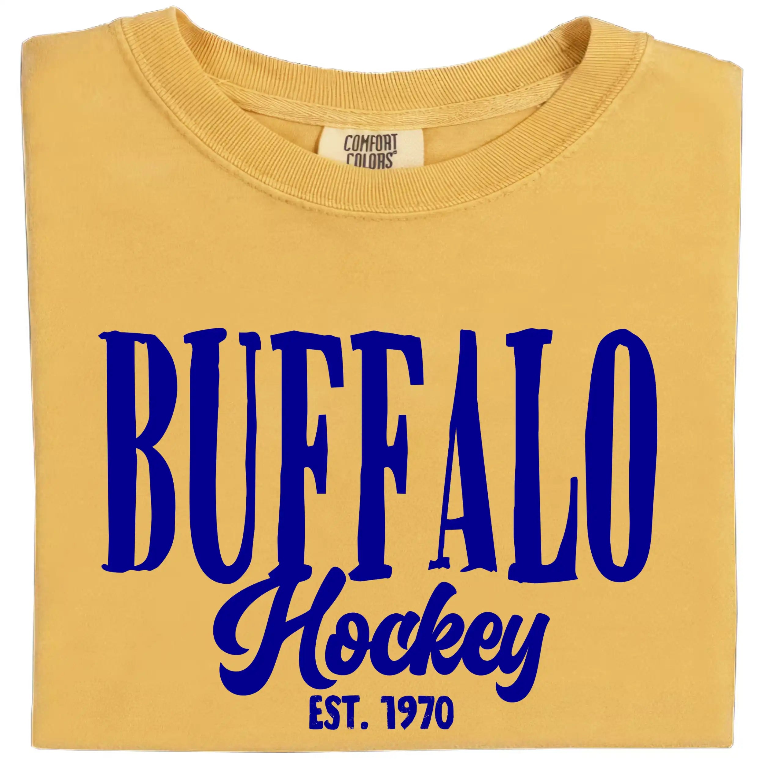 Gold Buffalo Hockey Est. 1970 t-shirt featuring bold blue vintage lettering, celebrating Buffalo hockey tradition with a timeless fan-inspired design.