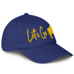 Blue low profile Buffalo hockey hat right side view showing gold Buffalo silhouette embroidery and curved brim design.