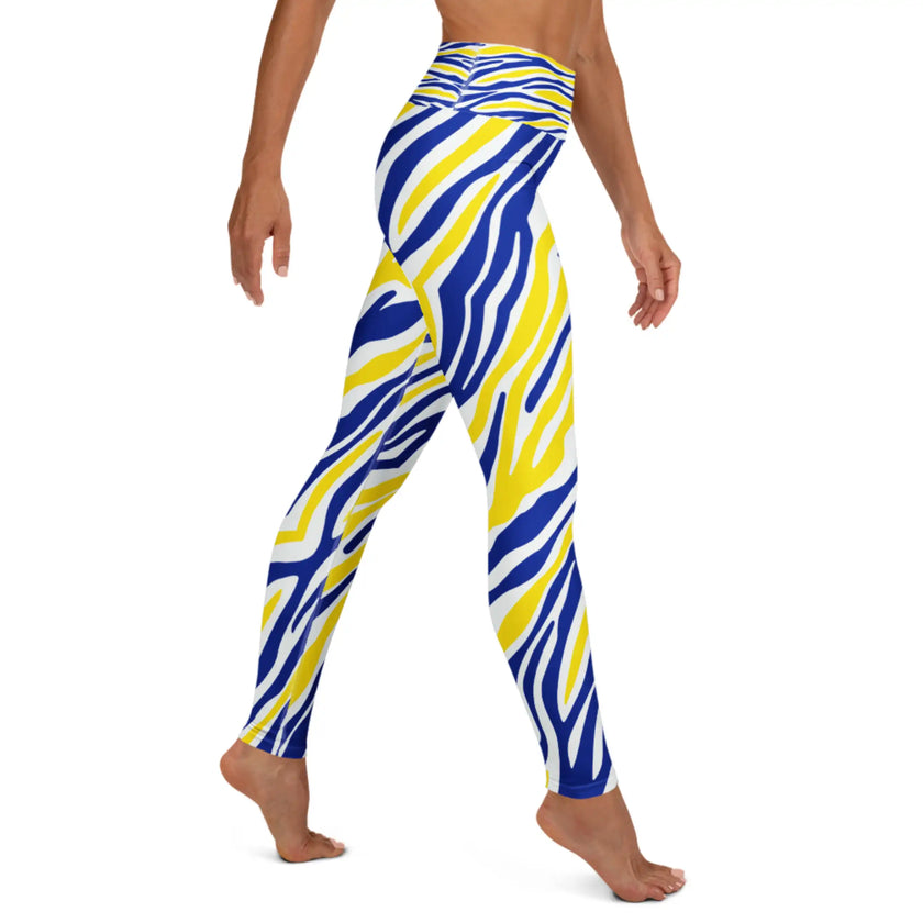 Right side view of Buffalo hockey apparel featuring original blue and gold stripes and a bold all-over Buffalo design.