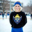 Female model wearing black Buffalo hockey sweatshirt with cool blue buffalo wearing striped blue yellow white sunglasses, cozy fan outfit.