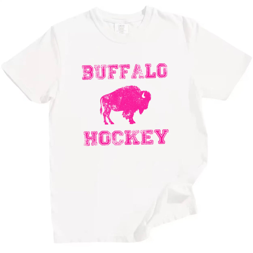 Women’s Buffalo hockey shirt in white, hot pink Buffalo Hockey lettering with buffalo silhouette design, sporty casual fan tee.