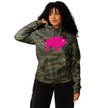 Close-up of woman wearing green camouflage Buffalo hoodie featuring oversized hot pink buffalo silhouette graphic, bold feminine Buffalo pride apparel.