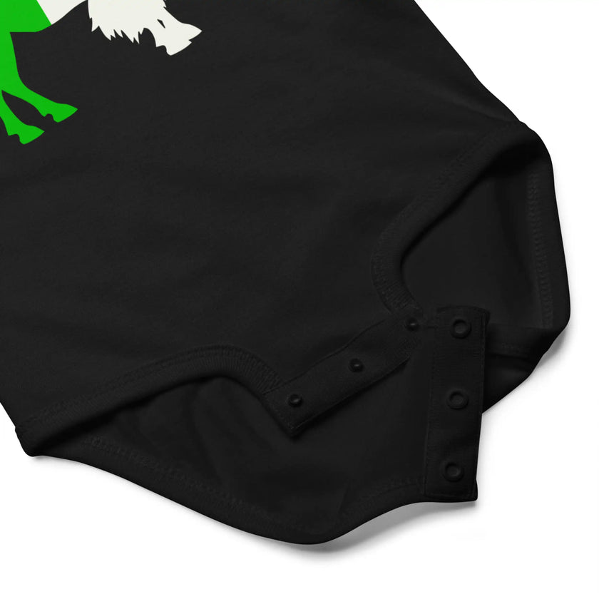 Close-up of black Buffalo Irish baby bodysuit snap closure detail for easy diaper changes and soft cotton baby clothing design.