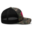 Right side view of camouflage Buffalo NY trucker hat featuring hot pink buffalo silhouette and rugged camo streetwear style.