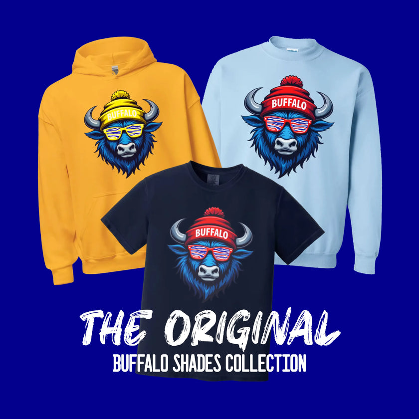 Buffalo Shades Collection featuring yellow Buffalo hockey hoodie, light blue Buffalo football sweatshirt, and navy Buffalo football t-shirt with Buffalo mascot sunglasses design on blue background.