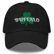 Black Buffalo Irish St. Patrick’s Day hat featuring large green embroidered shamrock and white ‘Buffalo’ script lettering for Buffalo city pride and festive game day style.