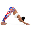 Woman in yoga pose wearing Buffalo stripes leggings with signature red white and blue Buffalo football stripe pattern, flexible athletic leggings for movement and style.