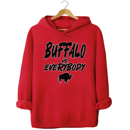 Red Buffalo football hoodie featuring ‘Buffalo vs. Everybody’ slogan in bold black lettering outlined in white with small buffalo silhouette graphic, game day fan apparel.