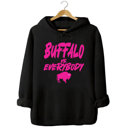 Black Buffalo football hoodie featuring ‘Buffalo vs. Everybody’ in bold hot pink lettering with matching hot pink buffalo silhouette underneath, stylish game day fan apparel.