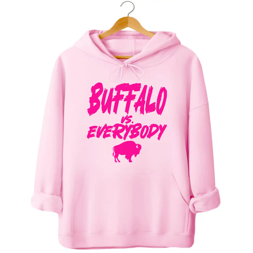 Light pink Buffalo football hoodie with ‘Buffalo vs. Everybody’ slogan in bright hot pink font and matching buffalo silhouette underneath, cute feminine football fan apparel.