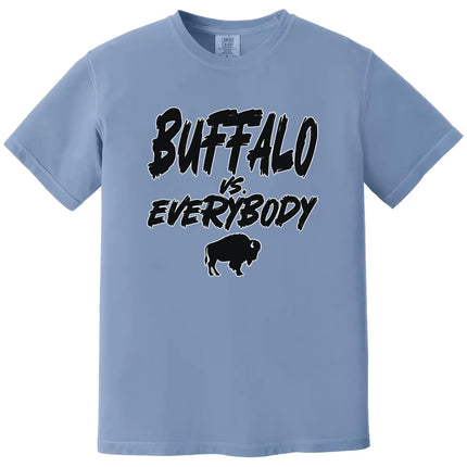 Light blue Buffalo football t-shirt featuring ‘Buffalo vs. Everybody’ graphic in bold outlined lettering with buffalo silhouette underneath, casual game day fan apparel.
