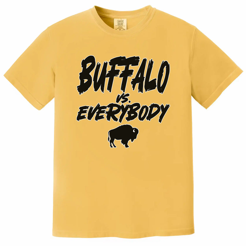 Yellow Buffalo football graphic tee featuring ‘Buffalo vs. Everybody’ slogan with black lettering outlined in white and small buffalo silhouette, bold fan apparel.