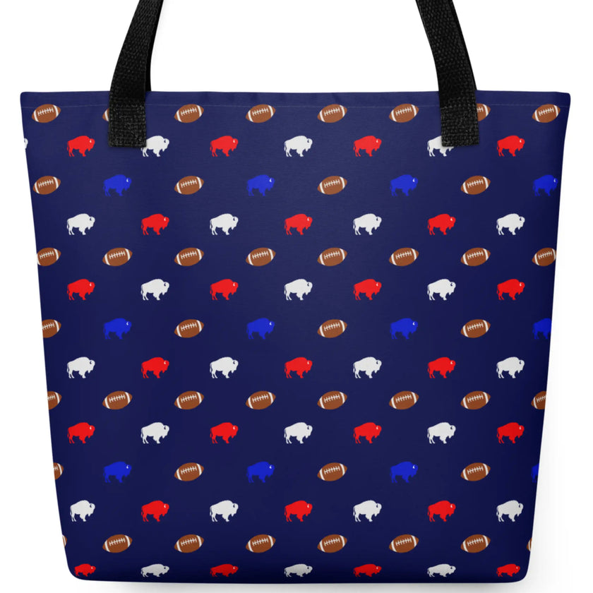 Cute navy blue Buffalo football tote bag featuring an all-over pattern of alternating tiny red white and blue buffaloes with miniature brown footballs, perfect for groceries, shopping, or everyday essentials.