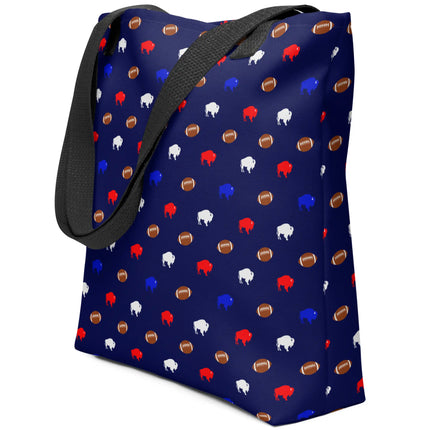 Side view of playful navy blue Buffalo football carryall bag showcasing the repeating pattern of colorful mini buffalo silhouettes and tiny brown footballs on an all-over print design.