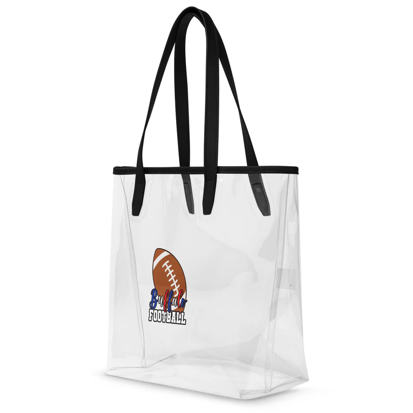 angled view of transparent TPU Buffalo football stadium tote bag with brown football design and Buffalo Football team graphics in blue and red white and blue lettering, compliant clear stadium bag.