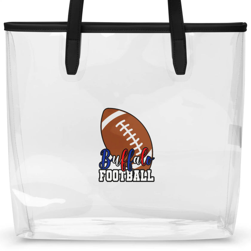 Close-up view of clear TPU Buffalo football stadium tote bag featuring Buffalo design with brown football graphic and ‘Buffalo Football’ lettering in blue and red white and blue team colors, transparent game day bag detail.