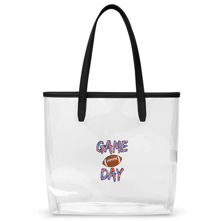 Clear TPU stadium tote bag featuring brown football graphic and bold Game Day lettering in red white and blue team colors, stadium-approved clear bag with black handles.
