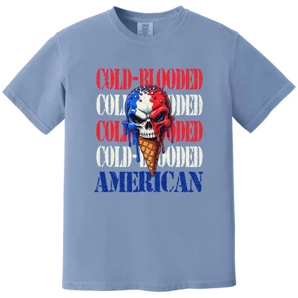 Skull ice cream patriotic t-shirt in blue, red white blue dripping cone design with distressed ‘Cold-Blooded American’ text, bold July 4th tee.