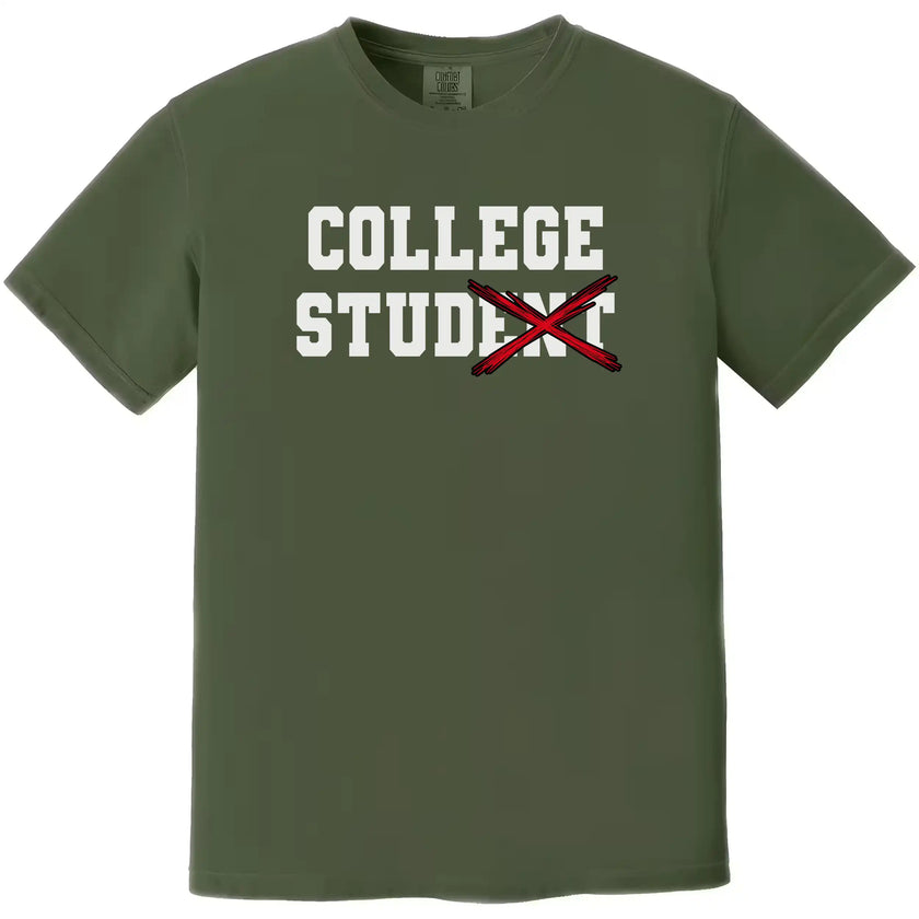 College Stud graphic tee in green, varsity lettering with red X crossing out text, funny college student humor shirt.