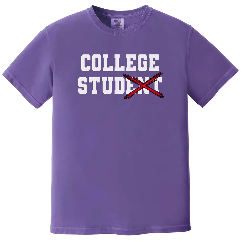 College Stud graphic tee in purple, varsity-style lettering with crossed-out text and red X, funny student humor shirt.
