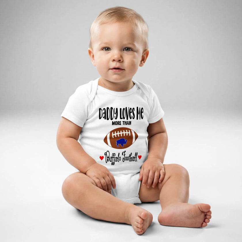 Front view of an adorable Buffalo football baby bodysuit featuring a football-shaped buffalo graphic, sweet red hearts, and a funny message celebrating dad’s love.
