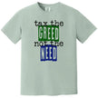 Green “Tax the Greed, Not the Need” t-shirt flat lay featuring bold letters and minimalist design for people-first advocacy