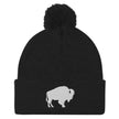 Black puffball pom pom beanie with embroidered Buffalo silhouette logo, warm winter hat inspired by Buffalo city and sports pride.”
