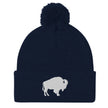 Navy pom pom beanie winter hat with embroidered Buffalo silhouette, classic Buffalo inspired winter headwear design with clean stitching.