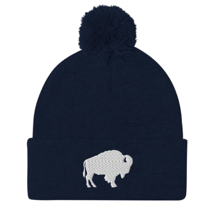 Navy pom pom beanie winter hat with embroidered Buffalo silhouette, classic Buffalo inspired winter headwear design with clean stitching.