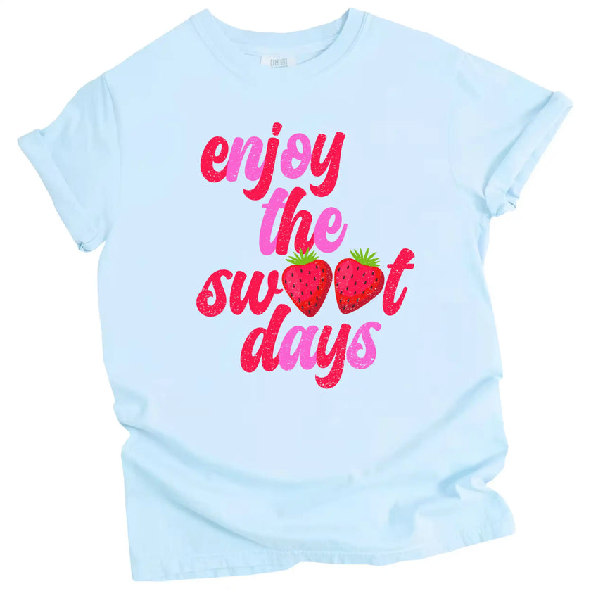 Summer strawberry tee in blue, ‘Enjoy the Sweet Days’ distressed retro font with strawberry letter detail, cute graphic shirt.