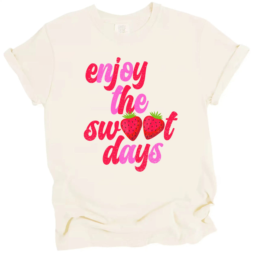 Enjoy the Sweet Days shirt in cream, distressed retro lettering with strawberry graphic detail, soft summer aesthetic tee